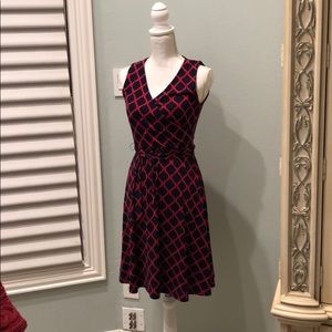 This is blue and red sleeveless mid length dress